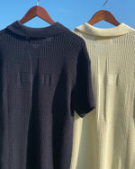 Load and play video in Gallery viewer, CROSS KNIT POLO OFF-WHITE
